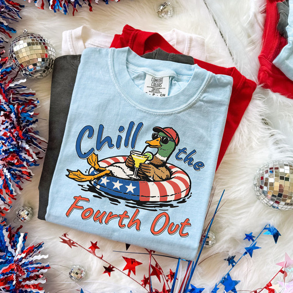 Chill The Fourth Out Duck DTF Heat Transfer, colorful t-shirt design with duck relaxing in a patriotic float, celebrating Independence Day.