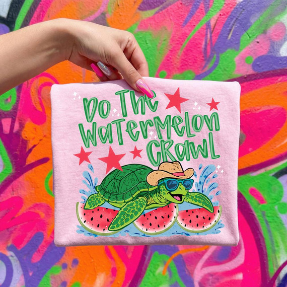 Do The Watermelon Crawl DTF Heat Transfer, colorful t-shirt with a cartoon turtle wearing sunglasses and a straw hat, surrounded by watermelon slices and stars, designed for summer fun and water-themed events.