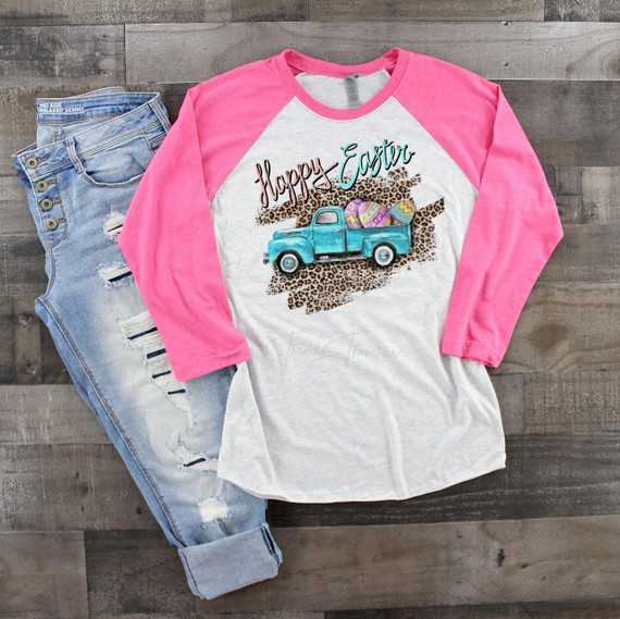 Vintage truck Easter Teal Leopard Sublimation Transfer, product image showing a graphic design on a long sleeve shirt featuring a teal truck with Easter eggs, leopard print background, and the text 'Happy Easter'.