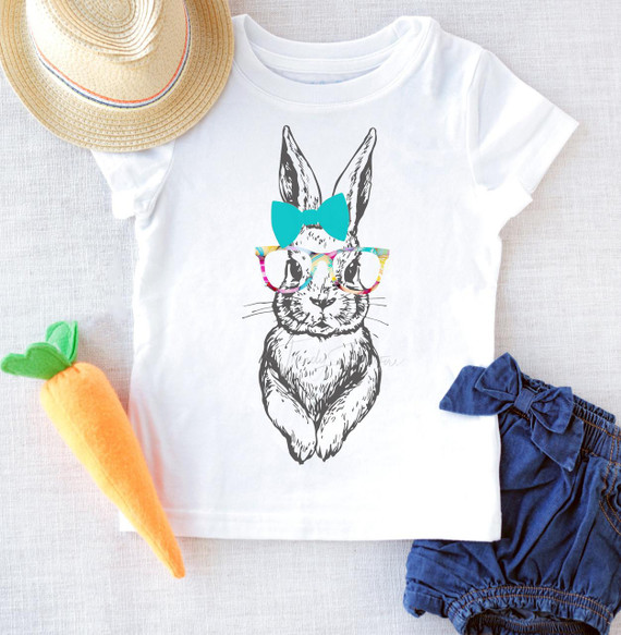 Cute Bunny Sublimation Transfer, adorable bunny illustration on a white t-shirt with colorful accessories like a blue bow and glasses.