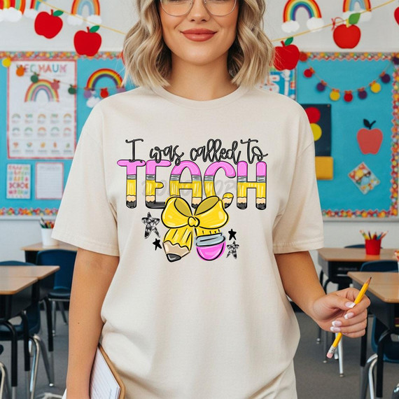 I Was Called To Teach DTF Heat Transfer T-Shirt, classroom background with colorful decorations and educational posters.