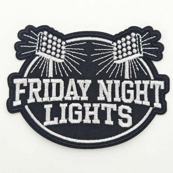 Friday Night Lights BLACK/SILVER Embroidered Hat Patch, embroidered patch featuring black and silver design with American flags and the text 'Friday Night Lights' in bold letters, 4x3 inches.