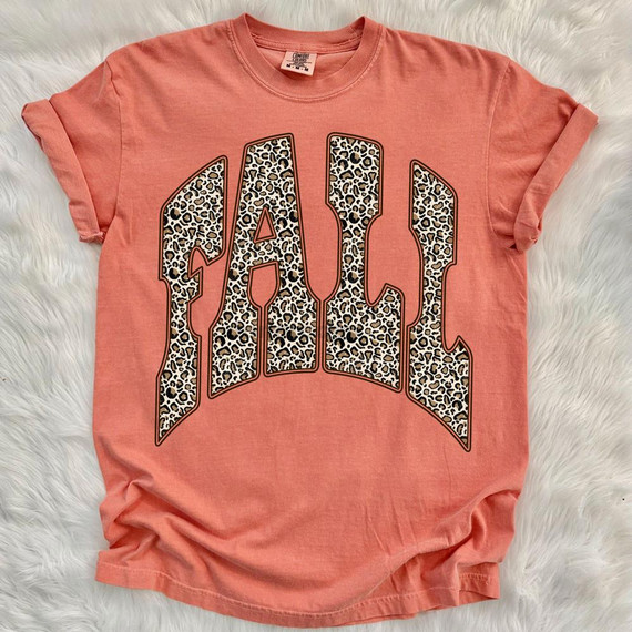 Leopard Fall DTF Heat Transfer, leopard print letter design on a peach-colored T-shirt.