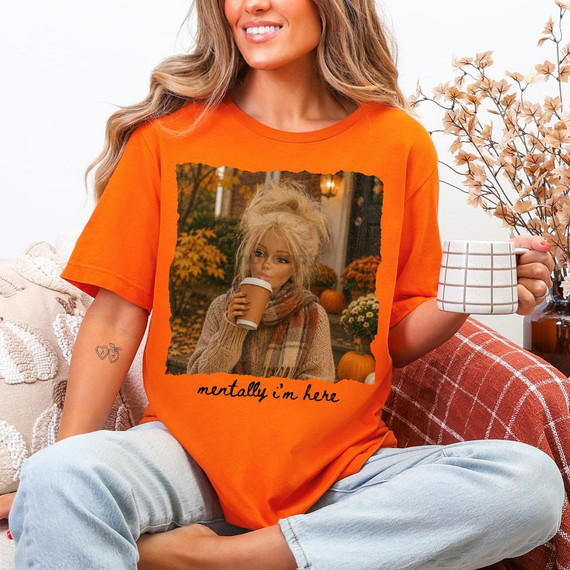 Mentally I'm Here Fall DTF Heat Transfer, orange T-shirt with fall-themed photo and text design.