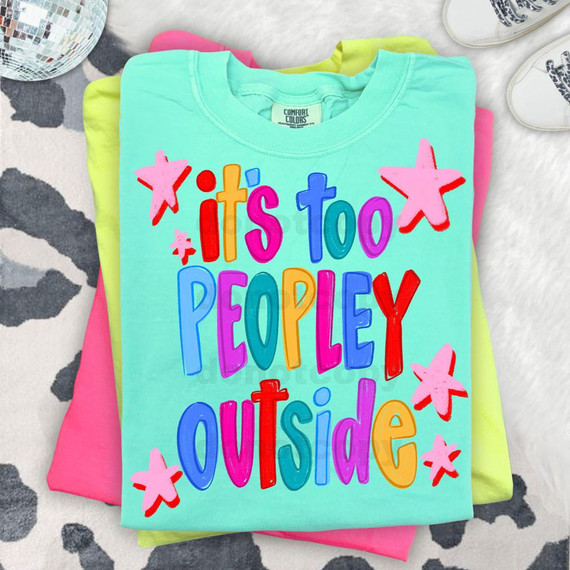 It's Too Peopley Outside DTF Heat Transfer, colorful graphic design on a mint green t-shirt with star illustrations.