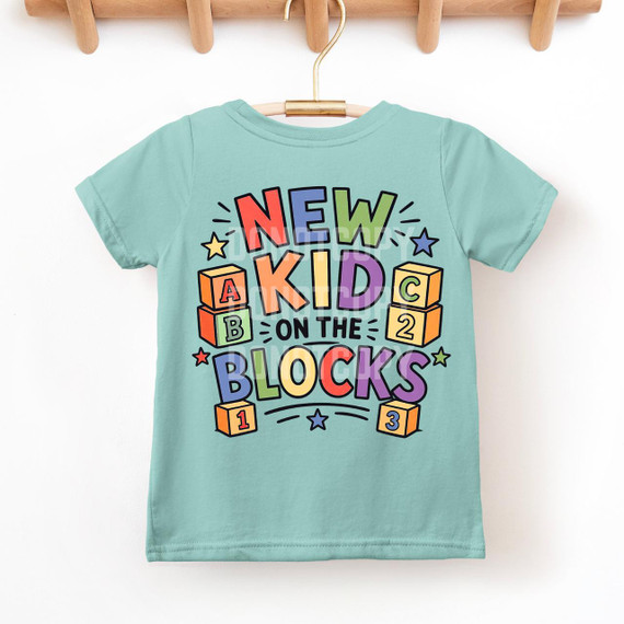 New Kid On The Blocks DTF Heat Transfer, colorful children's t-shirt with playful block and star design.