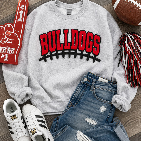 Red and black Bulldogs varsity chenille iron-on patch with embroidered football lace detailing for football spirit wear, game day apparel, and boutique clothing.