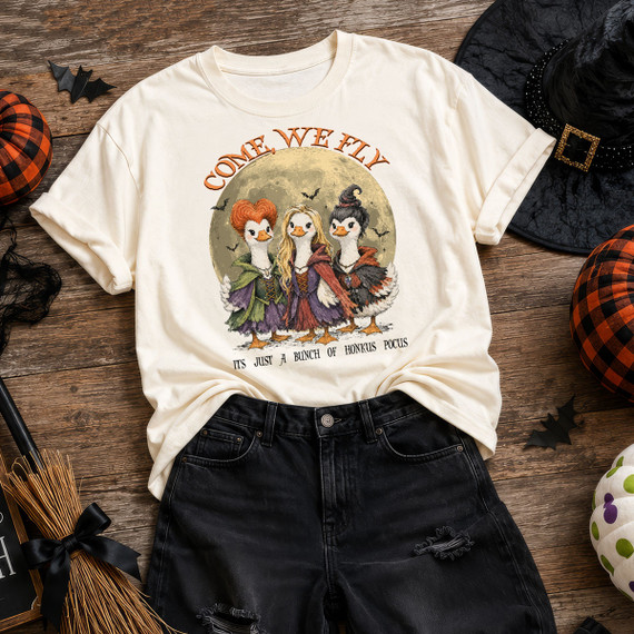Funny Halloween DTF transfer featuring three witch geese inspired by a classic spooky movie standing in front of a full moon with the phrases "Come We Fly" and "It's Just a Bunch of Honkus Pocus." Perfect for Halloween shirts, spooky season apparel, pumpkin patch outfits, and fall gifts.