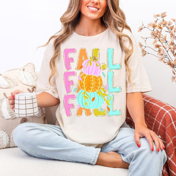 Faux Glitter Fall Pumpkin DTF Heat Transfer, colorful fall-themed pumpkin and leaves design on casual T-shirt.