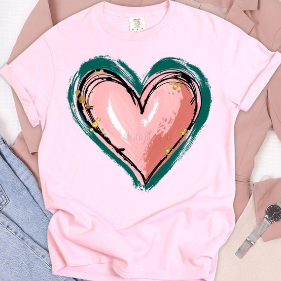 Pink Watercolor Heart DTF Heat Transfer, pink watercolor heart design on a light pink T-shirt for custom clothing decoration.
