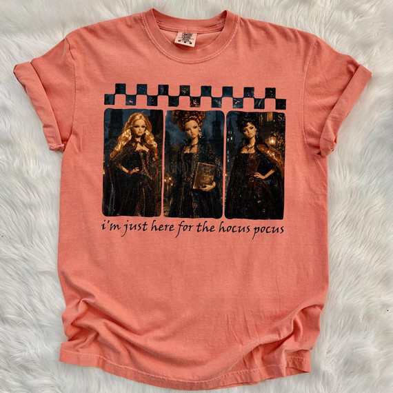 I'm Just Here for the HP Dolls DTF Transfer, pink T-shirt with Harry Potter characters printed on it.