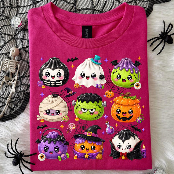Halloween Dumplings DTF Heat Transfer, colorful cartoon Halloween-themed dumpling characters with spooky accessories on a pink T-shirt.