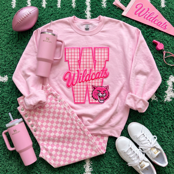 Pink gingham Wildcats appliqué embroidered patch with oversized varsity letter, Wildcats script and pink wildcat mascot on pink sweatshirt