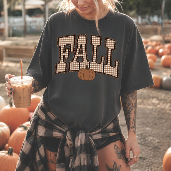 FALL DTF transfer with gingham and leopard print varsity lettering and a brown pumpkin graphic on a charcoal shirt
