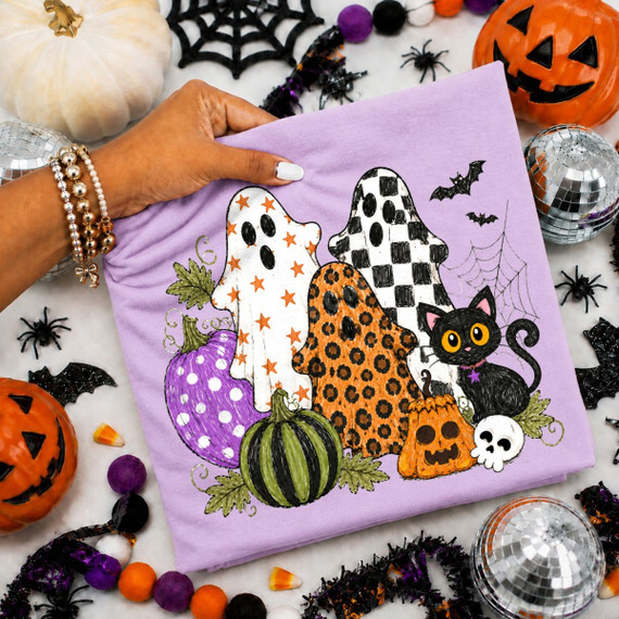 Patterned ghost trio DTF transfer with star, checkered, and leopard print ghosts, black cat, jack-o-lantern, skull, and pumpkins in a hand-drawn Halloween style