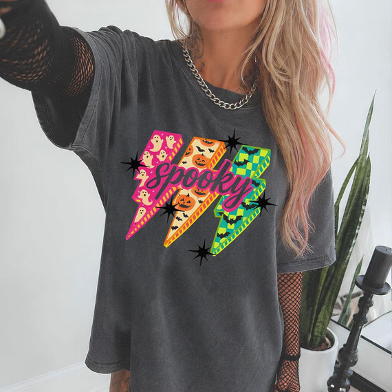 Spooky Lightning Bolts DTF Transfer, colorful ghost pumpkin bat Halloween heat transfer on a black t-shirt