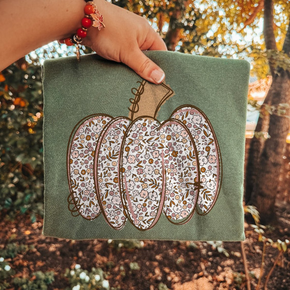 Floral pumpkin DTF transfer with pink and mustard ditsy flower pattern and hand-drawn vine stem, no stripes