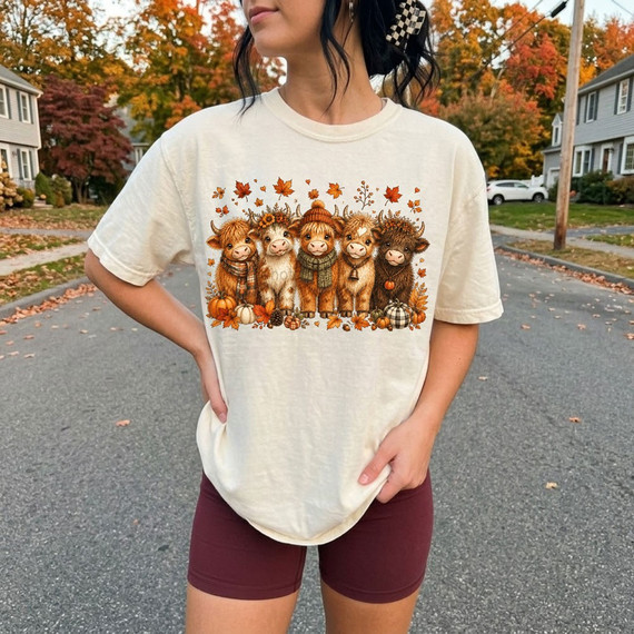 Fall highland cow DTF transfer featuring five cozy highland cows in scarves and beanies with pumpkins and autumn leaves