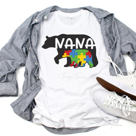 Autism Awareness Nana Bear Sublimation Transfer, white T-shirt with a bear silhouette filled with colorful puzzle pieces and the word 'MAMA' on top.