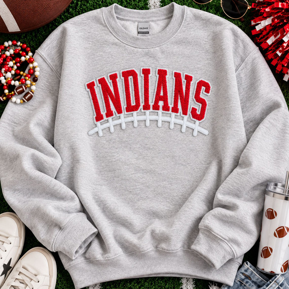 Red and white Indians football chenille patch with varsity lettering, puff embroidered football laces and thin sequin outline for game day apparel