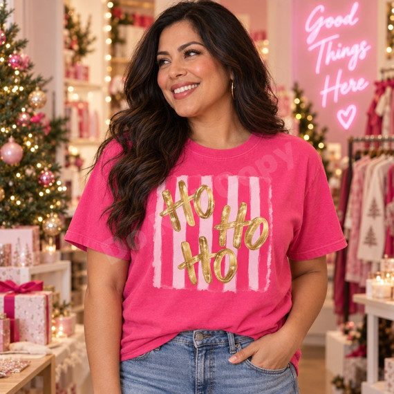 Ho Ho Ho DTF transfer with gold brush script lettering on a pink and light pink striped background, shown on a pink Christmas t-shirt Shown on a Watermelon t-shirt.
