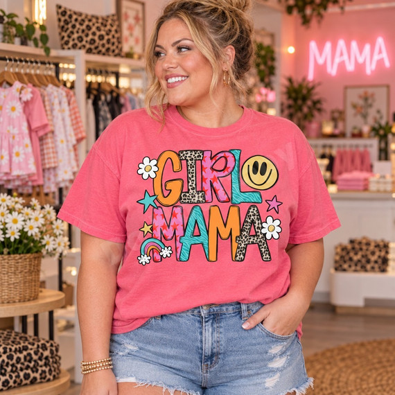 Girl Mama DTF transfer in retro bubble letters with leopard, zebra, and star patterns, daisies, stars, a smiley face, and a rainbow Shown on a Watermelon t-shirt.
