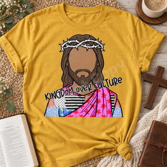 Kingdom Over Culture DTF Transfer | Boutique Patchwork Jesus Faith Design, colorful patchwork-style illustration of Jesus wearing a crown of thorns with “Kingdom Over Culture” lettering, displayed on a mustard yellow T-shirt