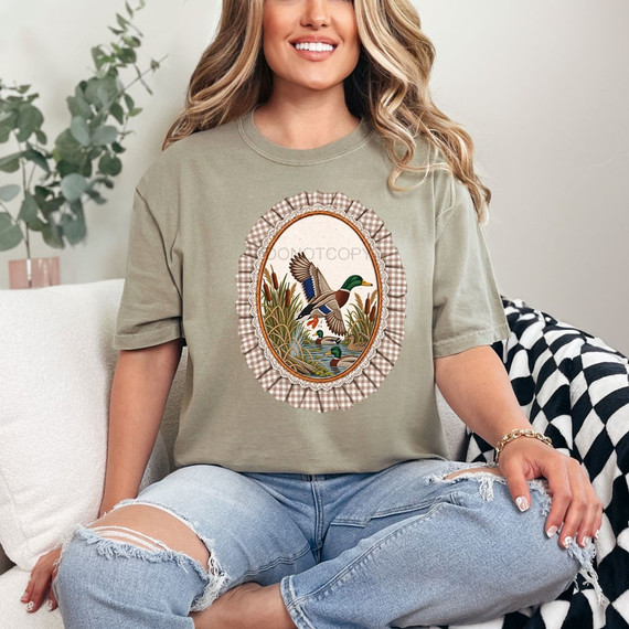 Faux-embroidery mallard duck DTF transfer with lace and gingham oval frame on khaki shirt