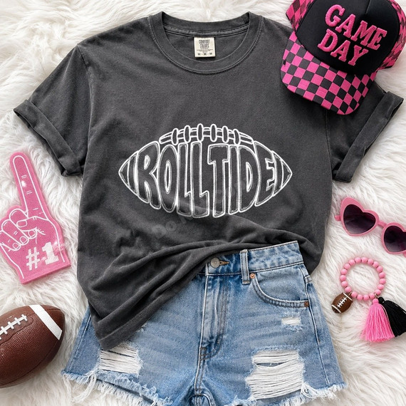 Roll Tide football outline DTF transfer in white hand-drawn lettering shaped like a football on a dark shirt