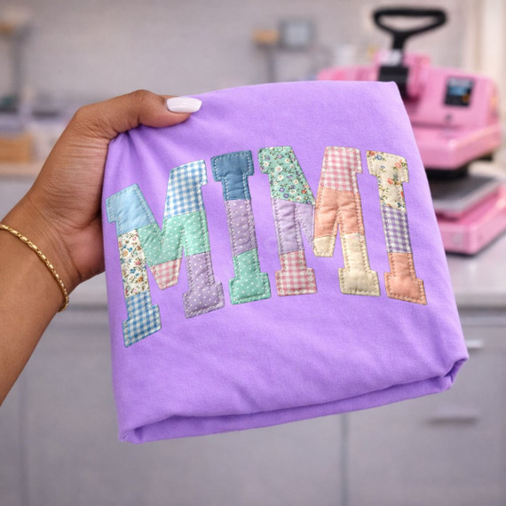 MIMI faux patchwork DTF transfer in pastel gingham and floral fabric-print letters on a purple shirt