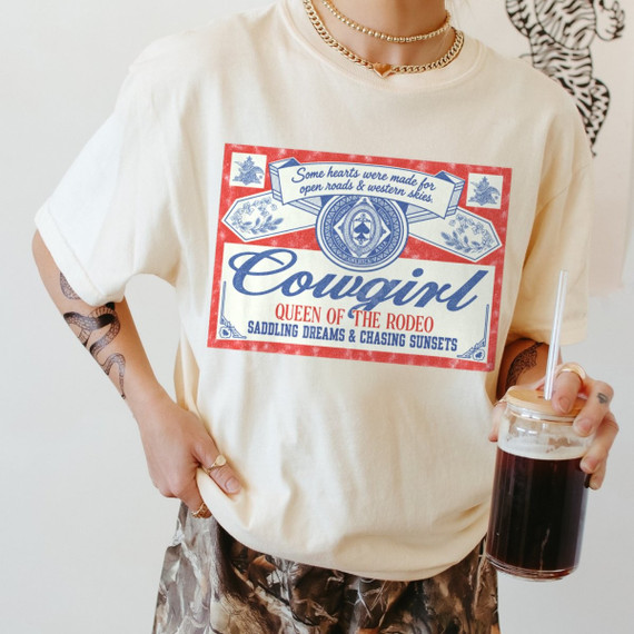 Cowgirl Queen of the Rodeo DTF transfer with vintage label-style design, blue script lettering, and red western border