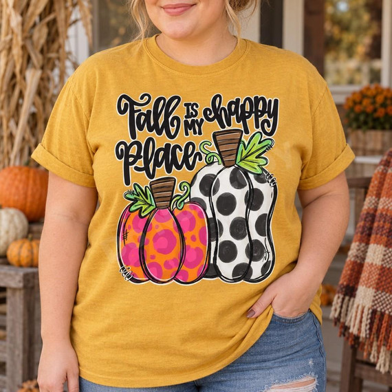 Fall Is My Happy Place DTF Transfer | Leopard & Polka Dot Pumpkin Design, colorful fall lettering and pink leopard-print and black polka-dot pumpkins displayed on a mustard yellow T-shirt