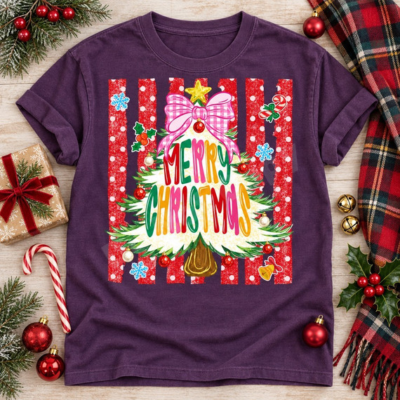 Merry Christmas DTF transfer featuring a flocked white Christmas tree with a pink gingham bow, yellow star, and colorful hand-lettered Merry Christmas text on a red polka-dot striped background with snowflake and candy cane stickers Shown on a Grape t-shirt.