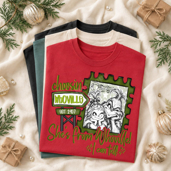 Choosin' Whoville DTF transfer with green Whoville road sign, postage stamp graphic of a furry green character and a little girl, and 'She's from Whoville! I can tell!' lettering