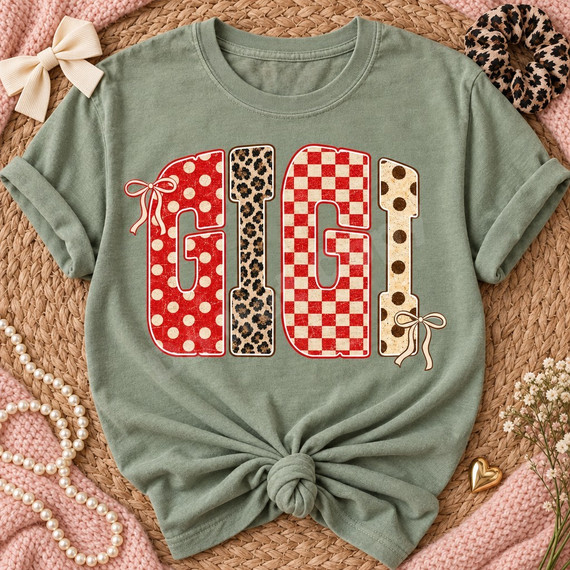 GIGI bubble letter DTF transfer with red polka dot, leopard, and checkerboard patterns and cream ribbon bow accents Shown on a Sage t-shirt.