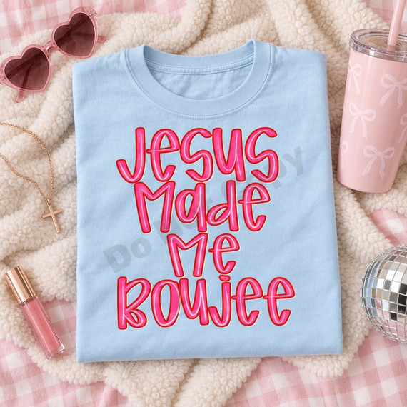 Jesus Made Me Boujee DTF transfer in chunky pink bubble lettering with red outlines and glossy white highlights on a light blue shirt Shown on a Ice Blue t-shirt.