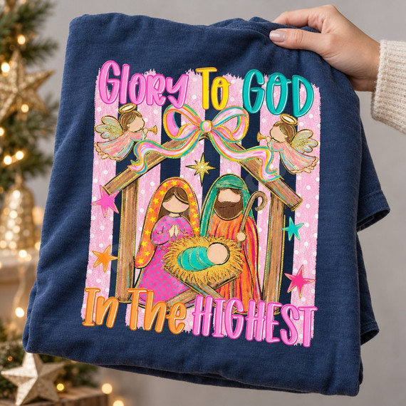 Glory To God In The Highest nativity DTF transfer with Mary, Joseph, baby Jesus, trumpeting angels, and a pastel bow on a pink striped background Shown on a Mystic Blue t-shirt.