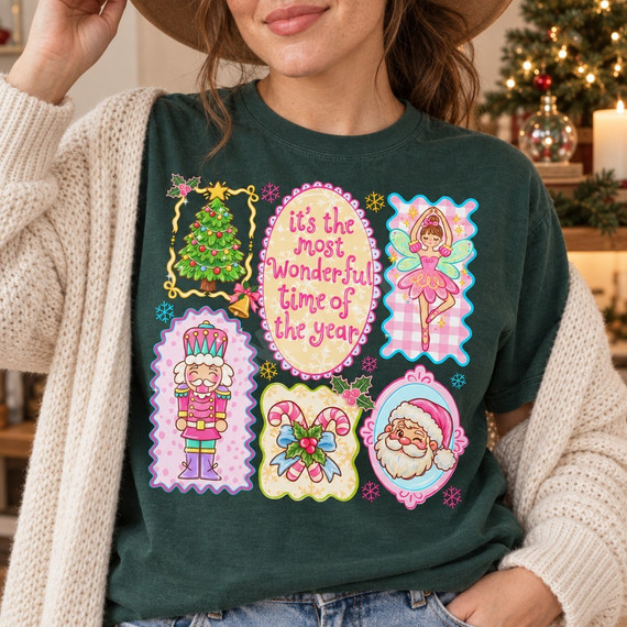 Pastel Christmas collage DTF transfer with hand-lettered 'It's the Most Wonderful Time of the Year', a Christmas tree, ballerina fairy, nutcracker, candy canes, and winking Santa face Shown on a Blue Spruce t-shirt.