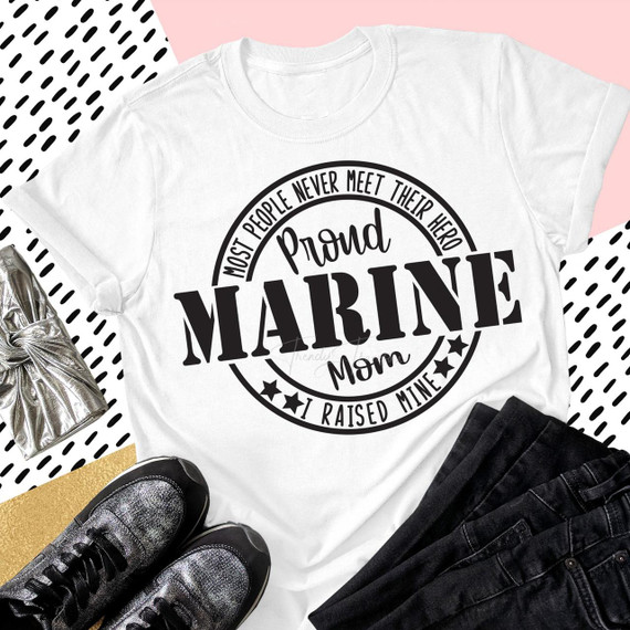 Proud Marine Mom Military Civil Servants Sublimation Transfer, white T-shirt with a circular design and text celebrating the pride of being a Marine mom.
