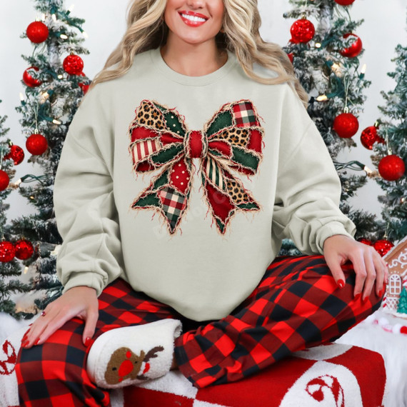 Christmas patchwork bow DTF transfer with plaid, leopard, and polka dot fabric-look print and frayed raw-edge detailing