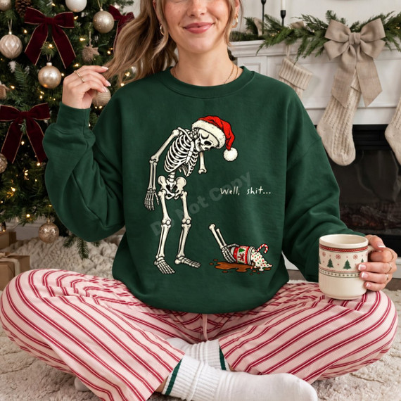 Well, shit... Christmas DTF transfer with santa hat skeleton spilling a holiday mug of hot cocoa