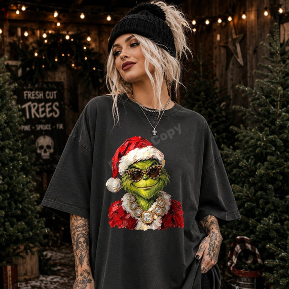 Painterly green Christmas character DTF transfer wearing a Santa hat, leopard sunglasses, and jeweled chain in a hand-painted art style