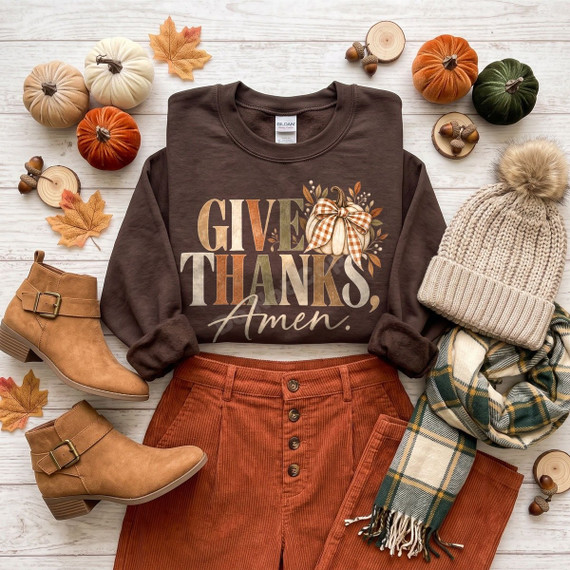 Give Thanks, Amen DTF transfer with watercolor lettering and a plaid-bow pumpkin design on a brown sweatshirt