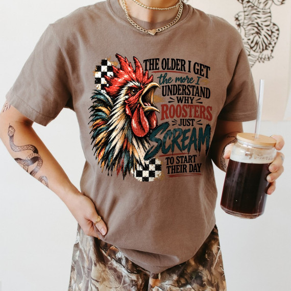 The Older I Get The More I Understand Why Roosters Just Scream To Start Their Day DTF transfer with bold rooster illustration and checkered accents