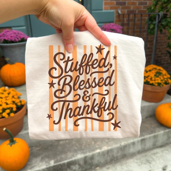 Stuffed, Blessed & Thankful DTF transfer with retro script lettering, stars, and orange striped background
