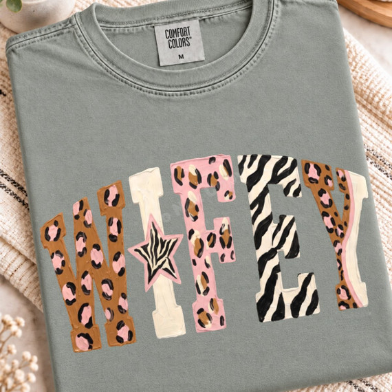 Wifey DTF transfer in bold varsity letters with mixed leopard print, zebra print, and a zebra print star accent