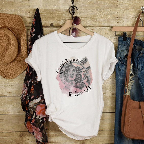 Wouldn't you love to love her Stevie Nicks Fan Art Sublimation Transfer T-shirt, featuring a graphic of Stevie Nicks with the quote 'Wouldn't you love to love her' and a pink watercolor background.