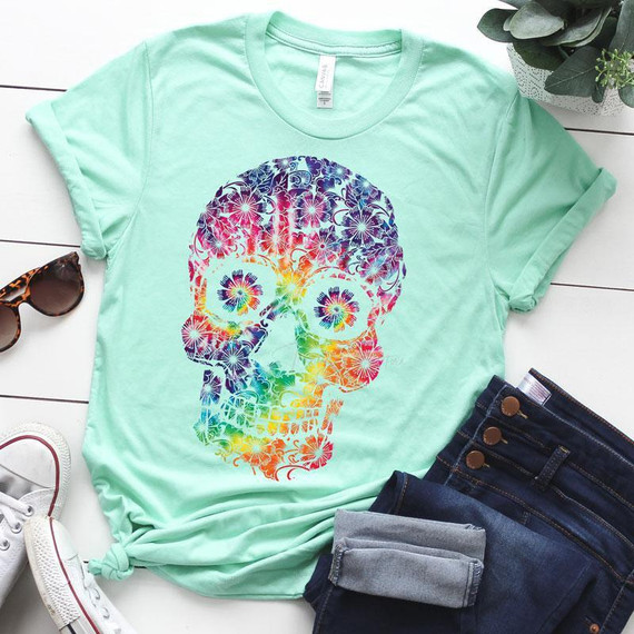 Tie Dye Floral Skull Screen Print Heat Transfer, colorful skull with floral patterns in a tie dye style on a mint green t-shirt.