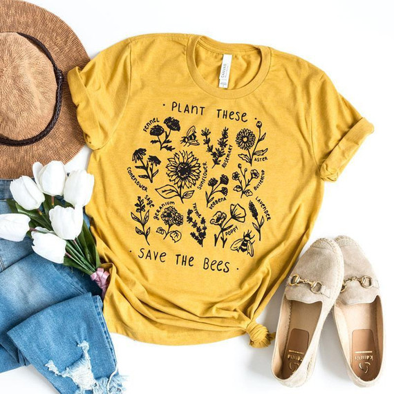 Plant These Save the Bees Screen Print Heat Transfer T-shirt, yellow graphic tee with bee and plant illustrations promoting bee conservation.