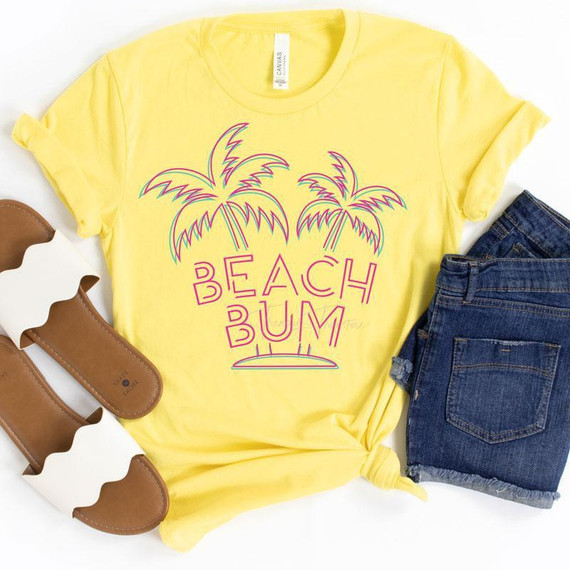 Beach Bum Screen Print Heat Transfer, vibrant yellow t-shirt with pink and neon-colored palm trees and text design.